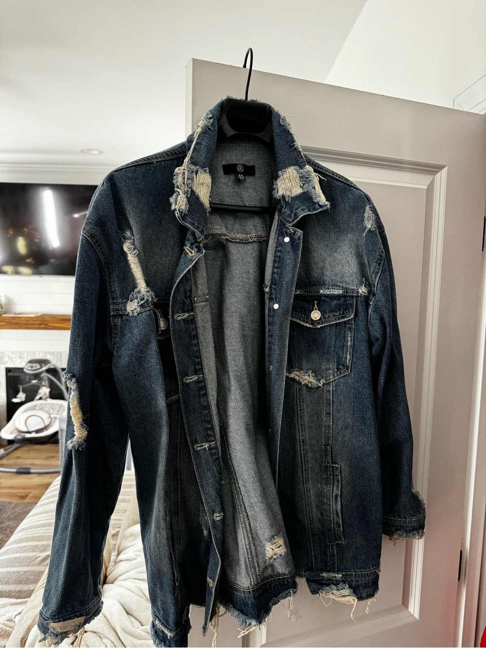 Distressed oversized denim jacket